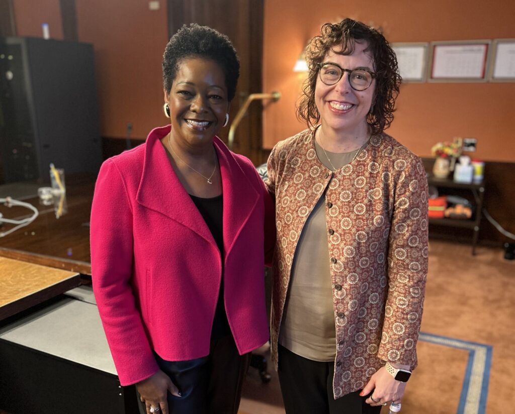 Justice Holder White and Stephanie standing in the courthouse following the bar admission ceremony